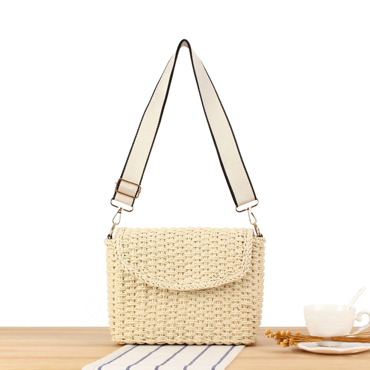 Handbag made of woven natural material with adjustable shoulder strap Stornfield