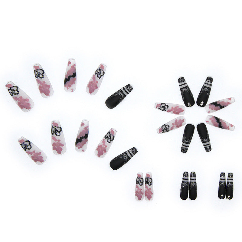 Artificial nail set with creative 3D elements and sparkling accents Stornfield