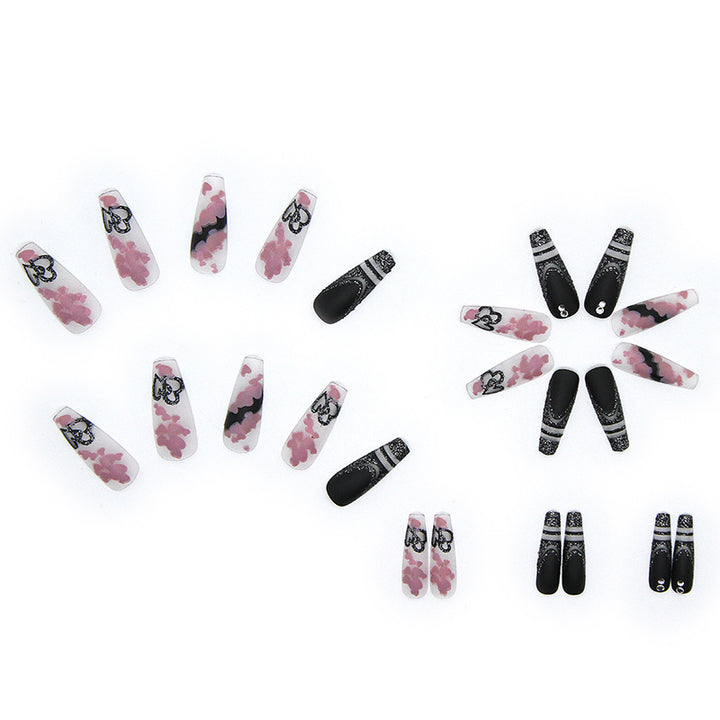 Artificial nail set with creative 3D elements and sparkling accents Stornfield