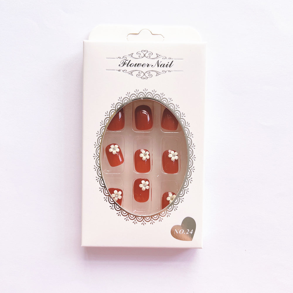 Elegant artificial nails with floral designs Stornfield