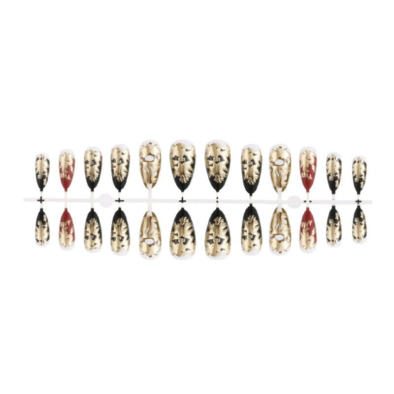 Elegant artificial nails with gold and black pattern Stornfield