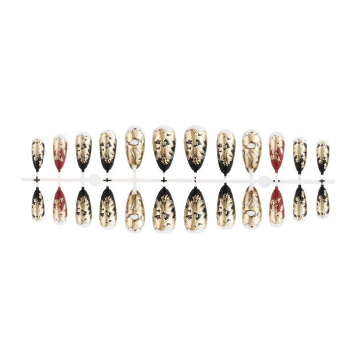 Elegant artificial nails with gold and black pattern Stornfield