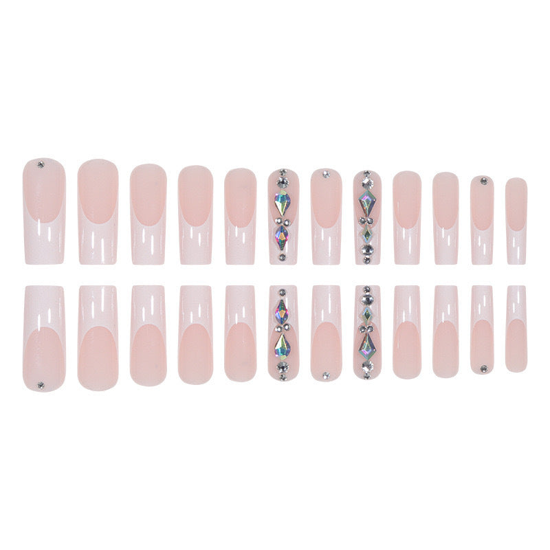 Artificial nail set with glamorous rhinestones and 3D decorations Stornfield