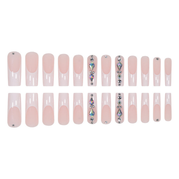 Artificial nail set with glamorous rhinestones and 3D decorations Stornfield