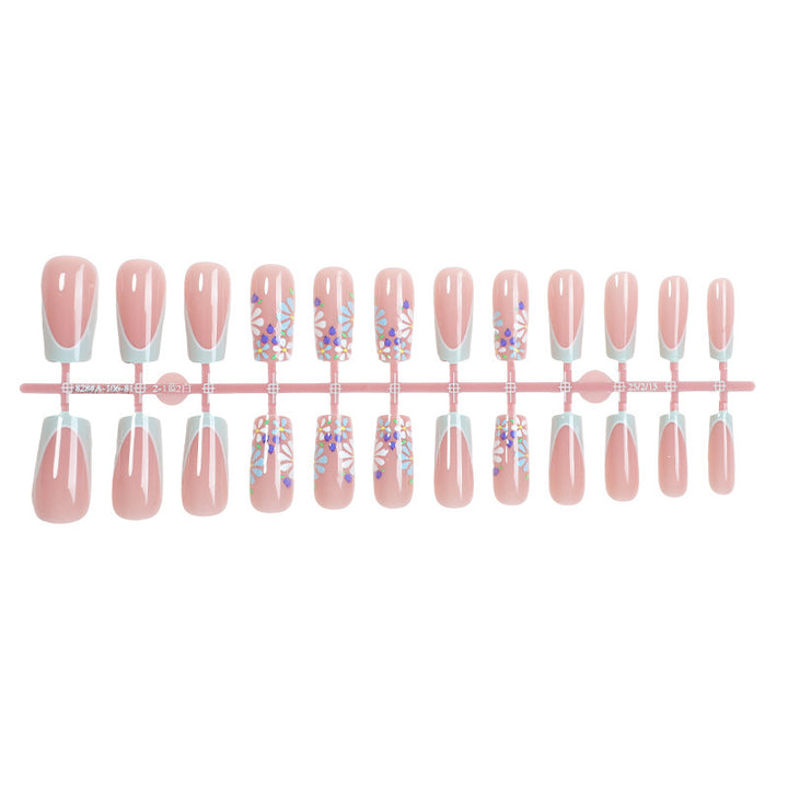 Creative nail art set with floral and shiny accents Stornfield