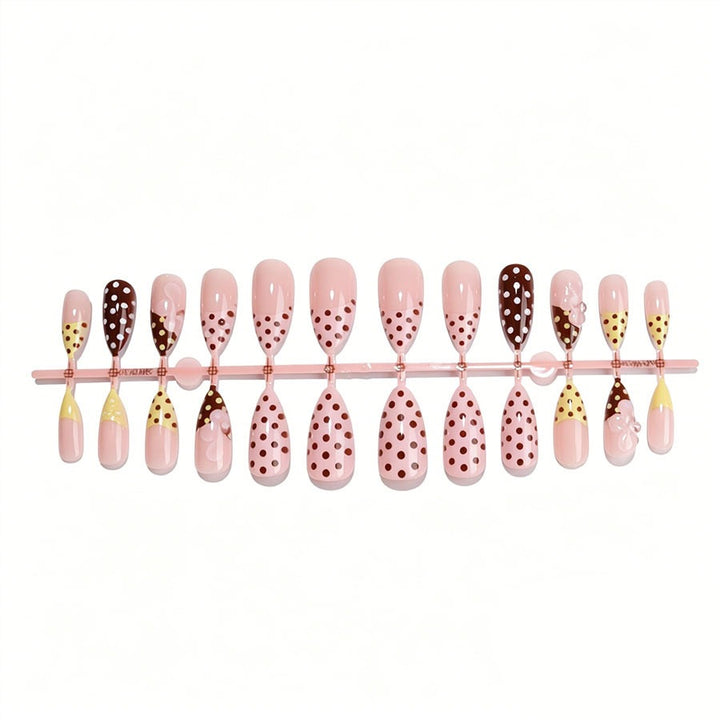 Creative nail art set with floral and polka dot design Stornfield