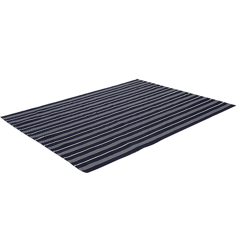 Flat-woven striped living room rug with low pile and non-slip backing