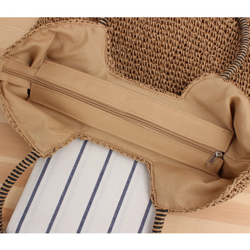 Handmade straw shoulder bag with structured design Stornfield
