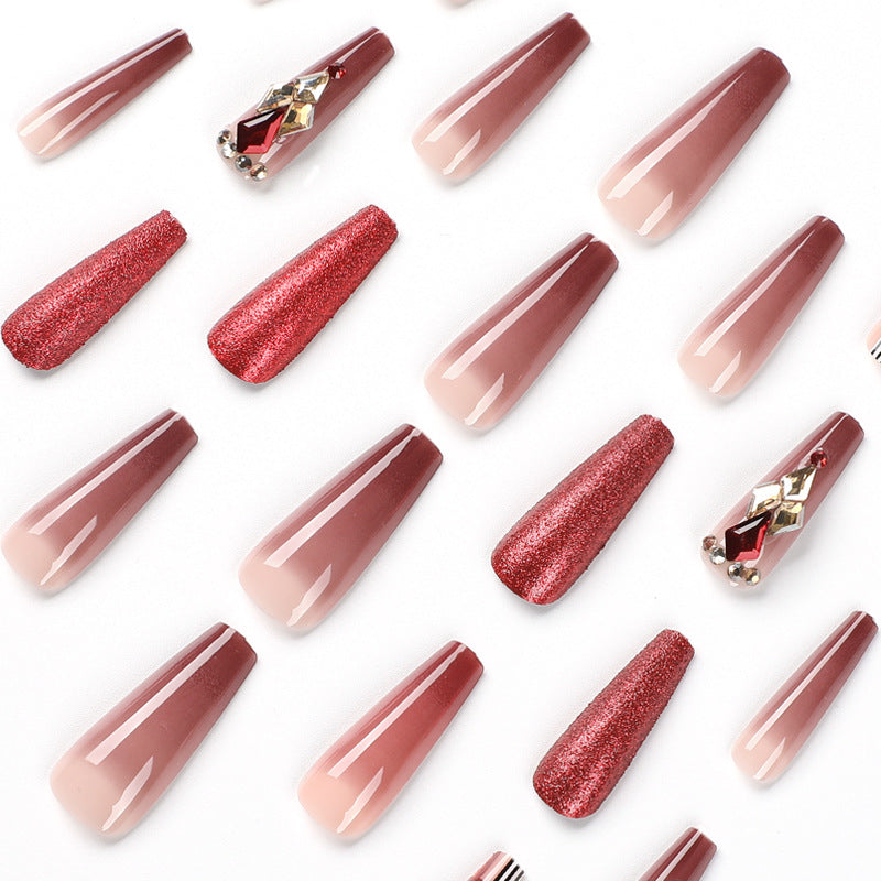 Glamorous stiletto nails with extravagant design and glitter accents Stornfield
