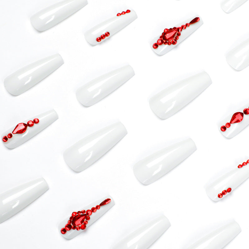 Artful nail extensions with glitter accents and elegant embellishments Stornfield