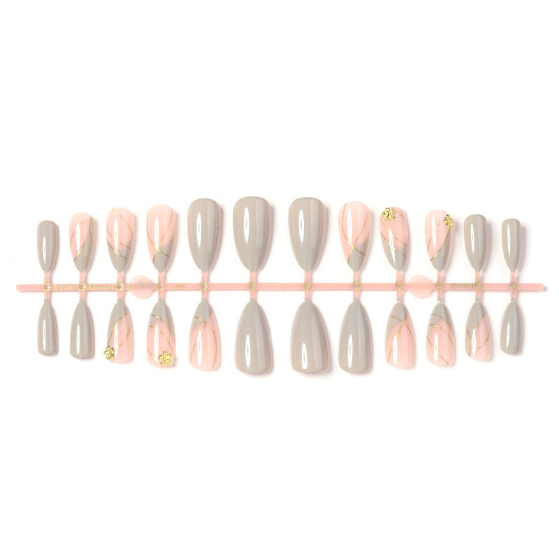Artificial nail set with elegant marble design and gold accents Stornfield