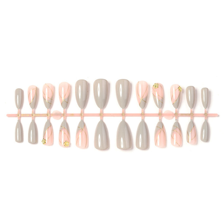 Artificial nail set with elegant marble design and gold accents Stornfield