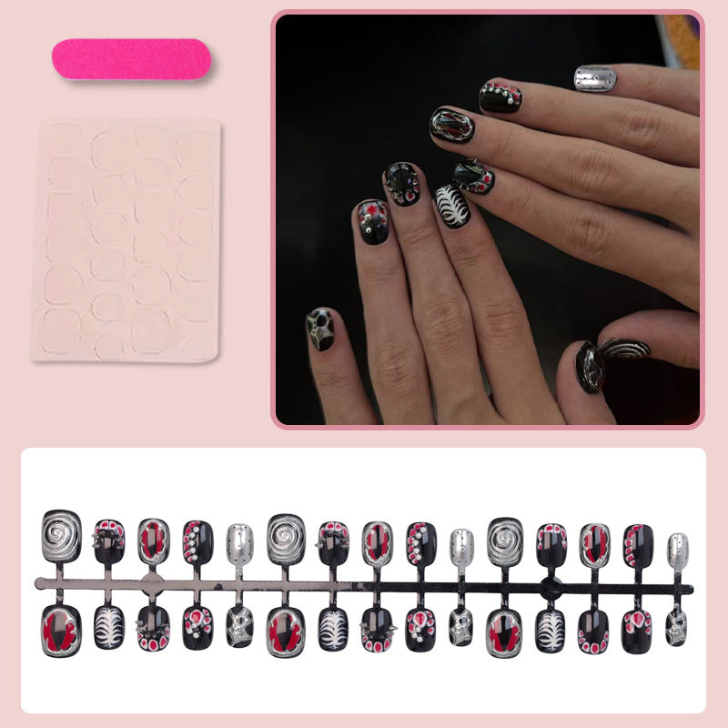 Artificial nail set with creative patterns and glamorous details Stornfield