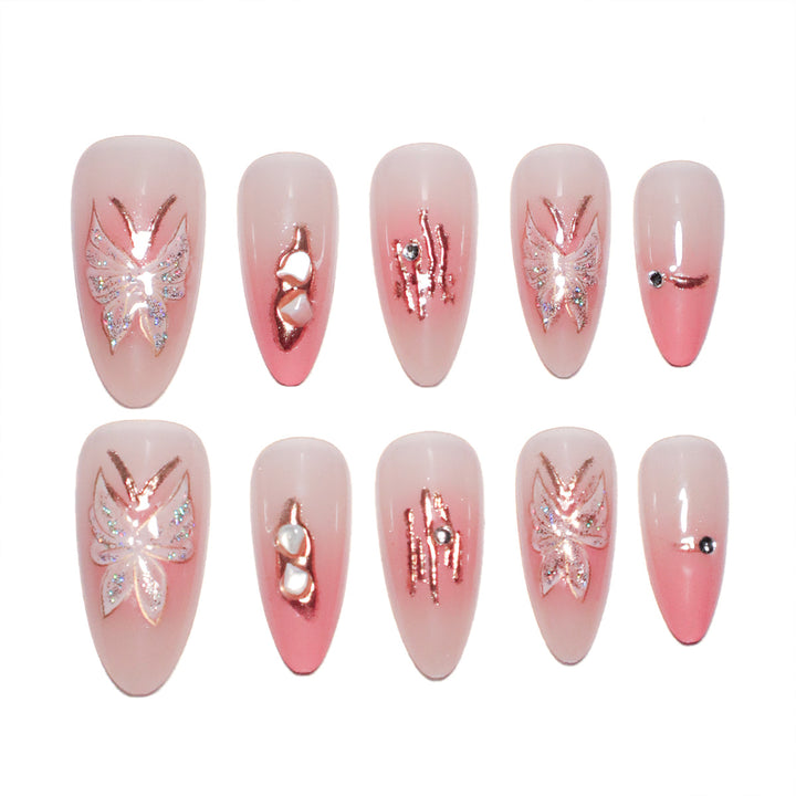 Artificial nail extensions with floral motifs and glitter accents Stornfield