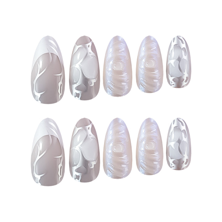 Elegant Stiletto Nail Extensions with Decorative Silver Accents Stornfield