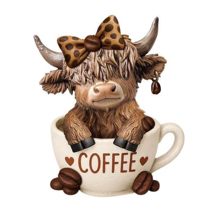 Decorative figure of a Highland cow with accessories Stornfield