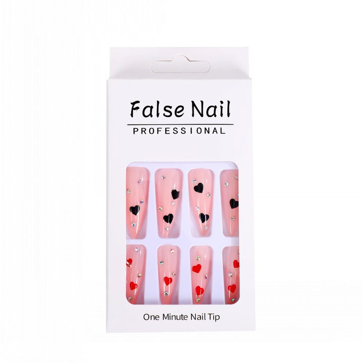 Glamorous artificial nails with heart accents Stornfield