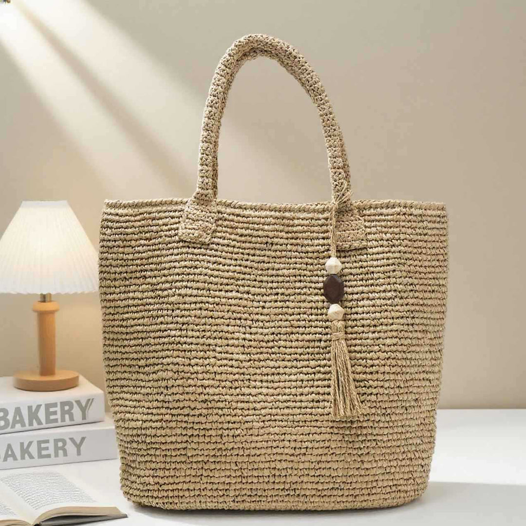 Handmade basket bag with unique fringe pendant Stornfield