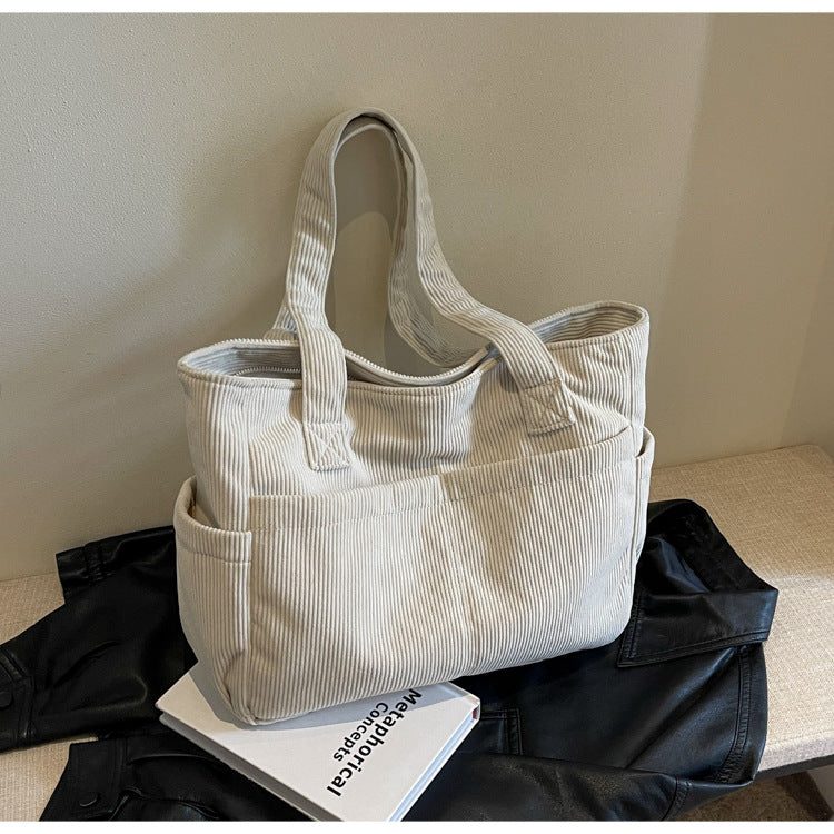 Multifunctional shoulder bag with large outer pockets Stornfield
