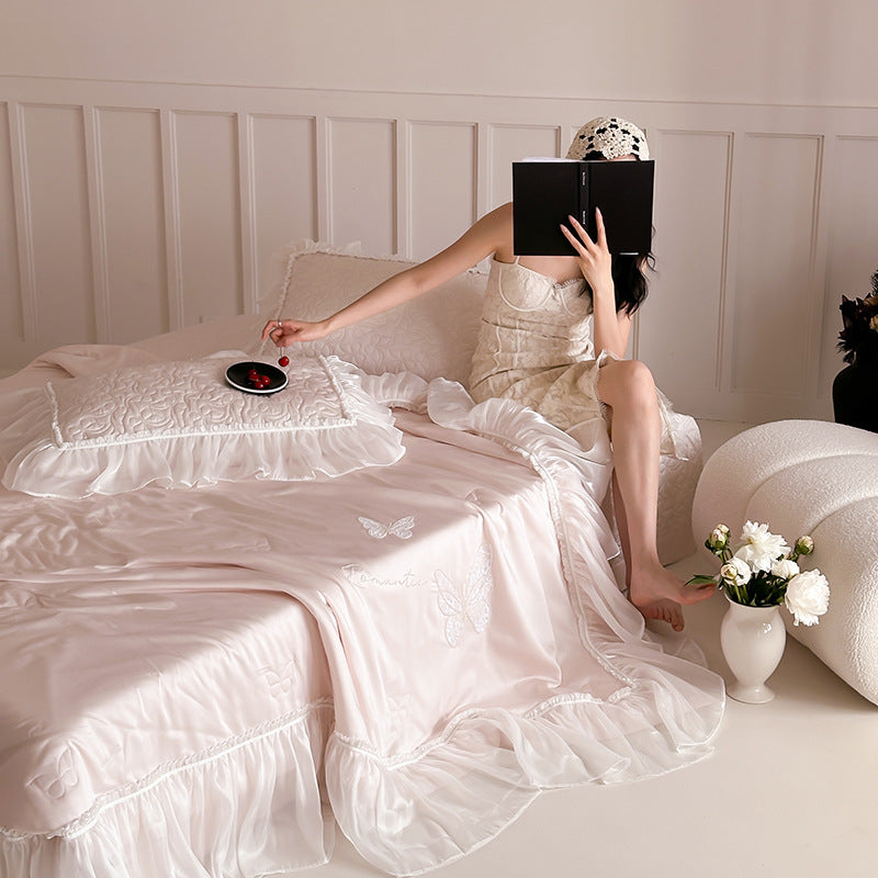 Luxurious satin bedding set with fine ruffle trimming & embroidered butterfly motifs