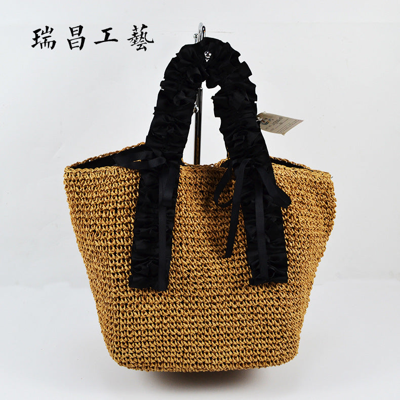 Crocheted beach bag with elegant satin accents Stornfield
