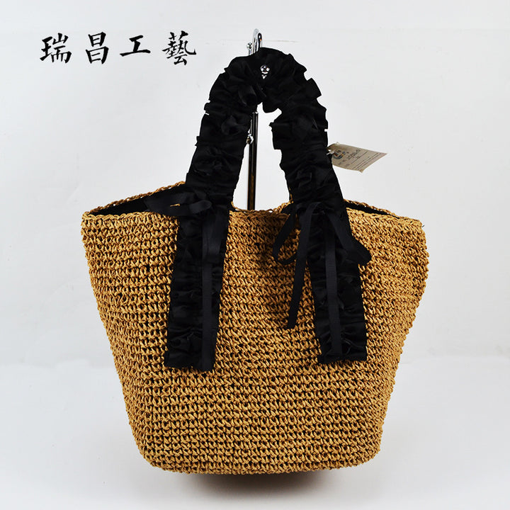 Crocheted beach bag with elegant satin accents Stornfield