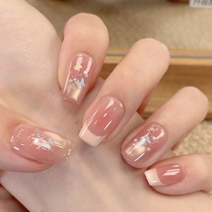 Stylish Press-On Nail Extensions with Artistic Accents