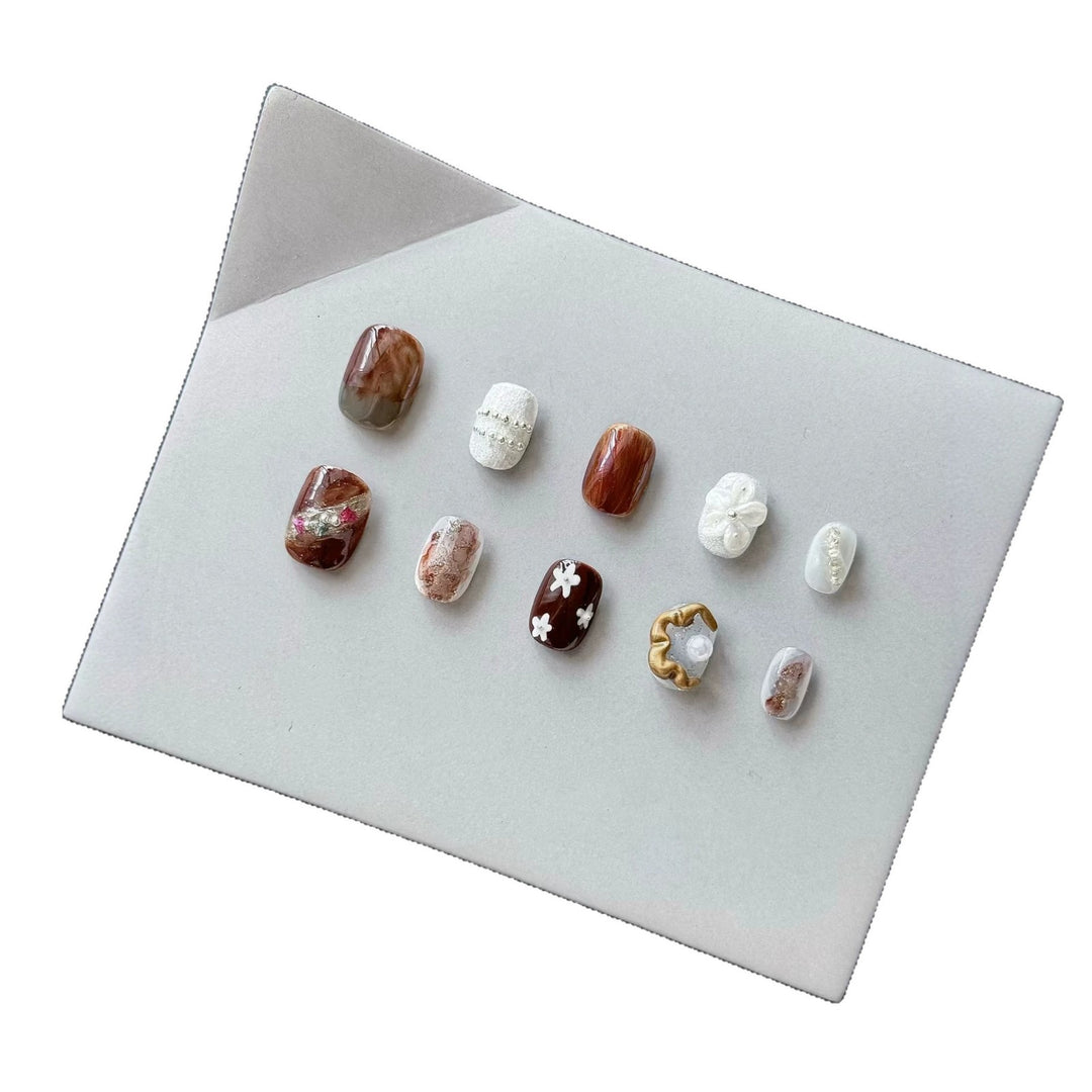 Artistic Press-On Nail Set with Unique Textures and Designs