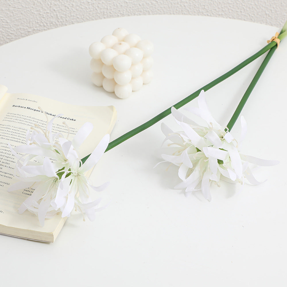 Artificial blossom branch with delicate flowers
