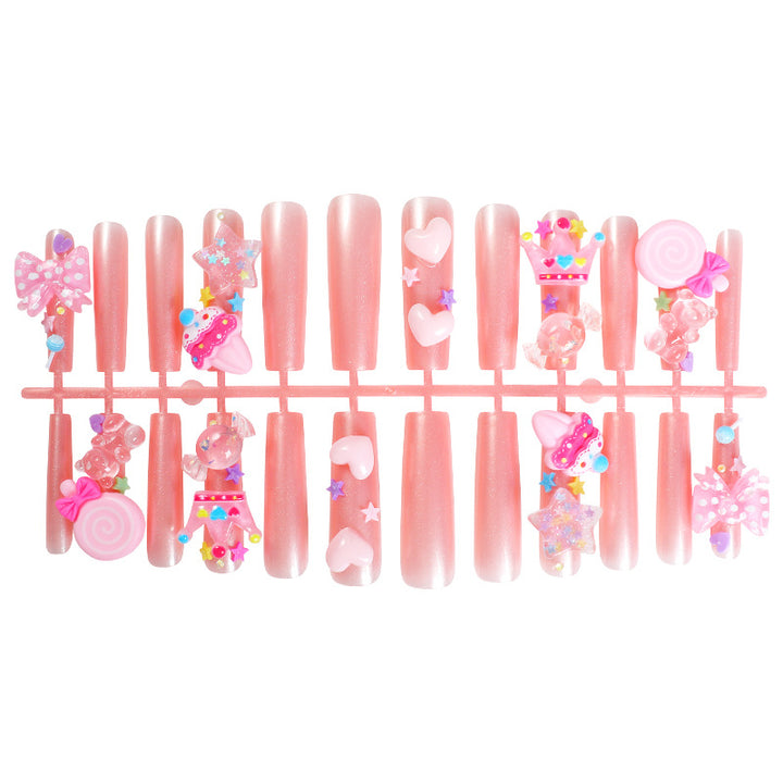 Creative nail art set with playful designs and glitter accents Stornfield