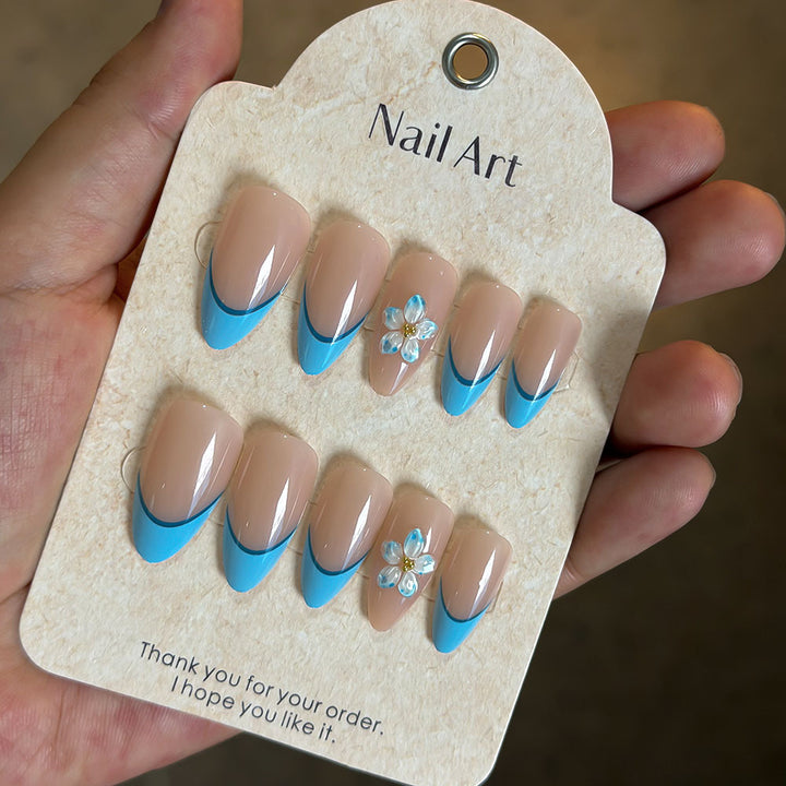 Artistic Press-On Nail Kit with Floral Accents Stornfield