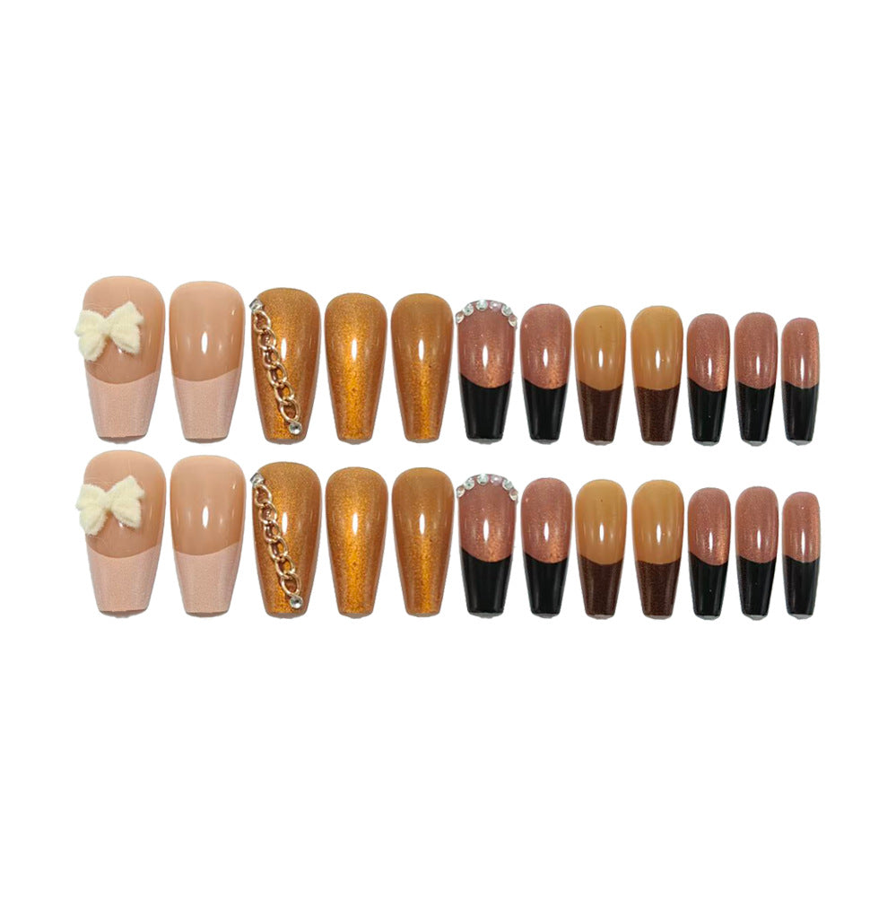 Glamorous artificial nails with glittering design and elegant embellishments Stornfield
