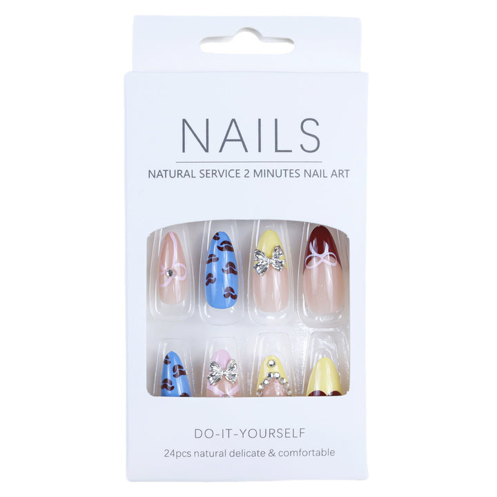 Artificial nails with playful design and 3D embellishments Stornfield