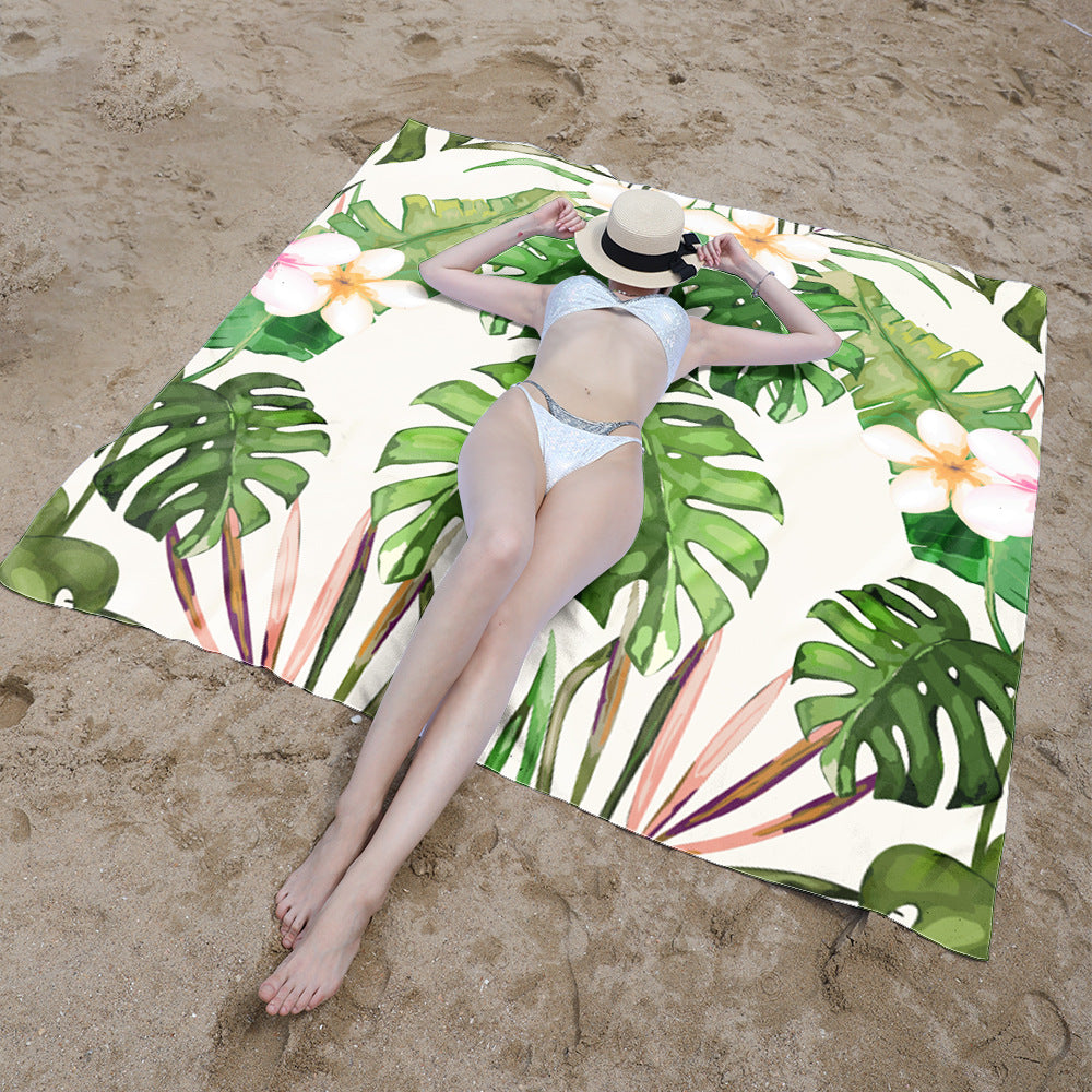 Beach blanket with vibrant floral pattern and innovative structure Stornfield