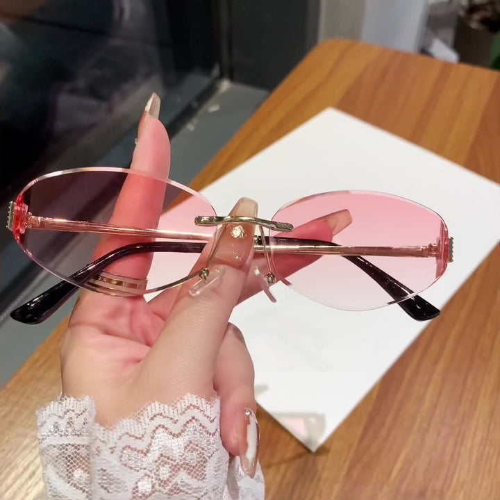 Ladies sunglasses in modern oval design with contrasting frame Stornfield