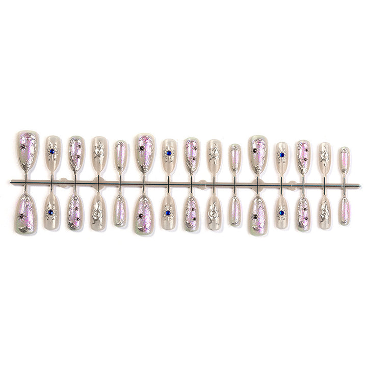 Acrylic nail set with holographic accents and elegant embellishments Stornfield