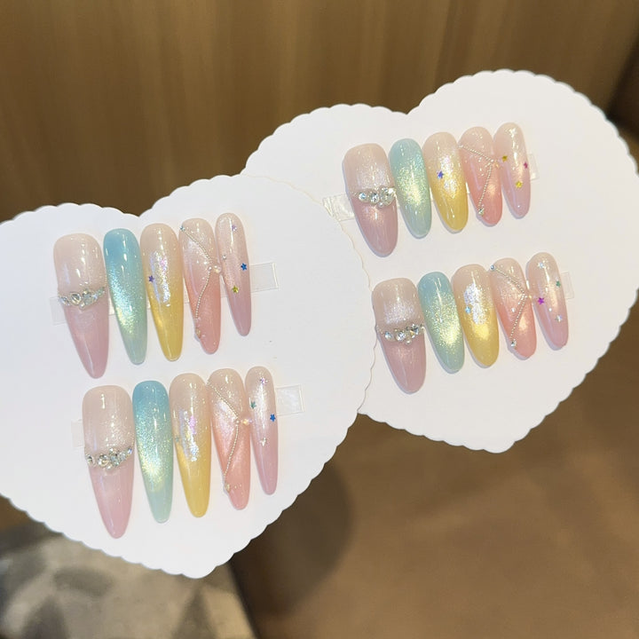 Artificial nails with shimmering effects and sparkling rhinestone details Stornfield