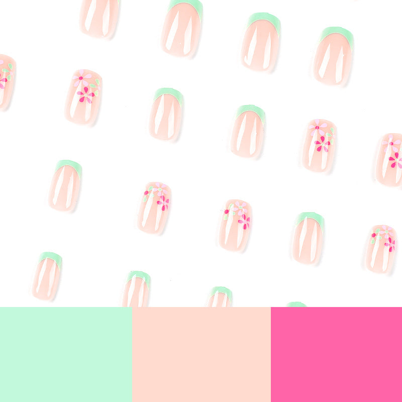 Artificial nails with floral accents and neon tips Stornfield
