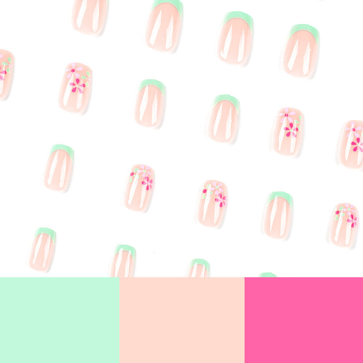 Artificial nails with floral accents and neon tips Stornfield