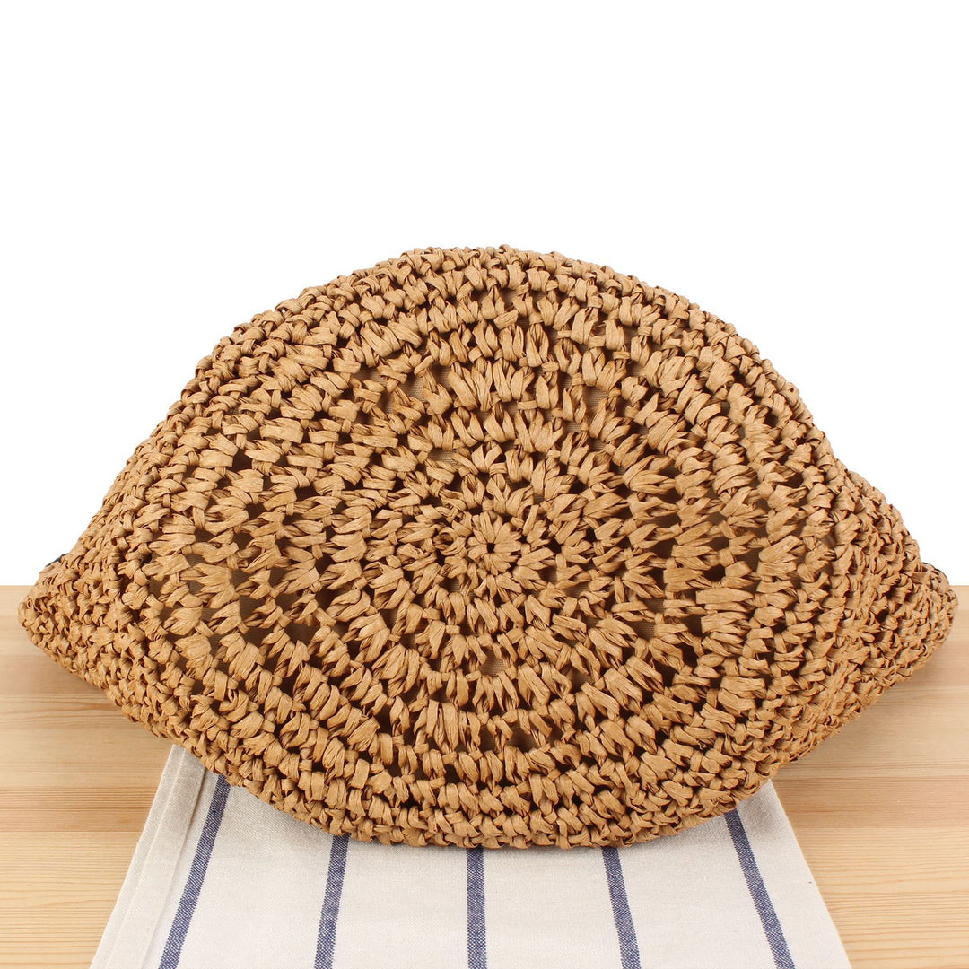 Beach shoulder bag made of handwoven natural material with comfortable carrying handles Stornfield