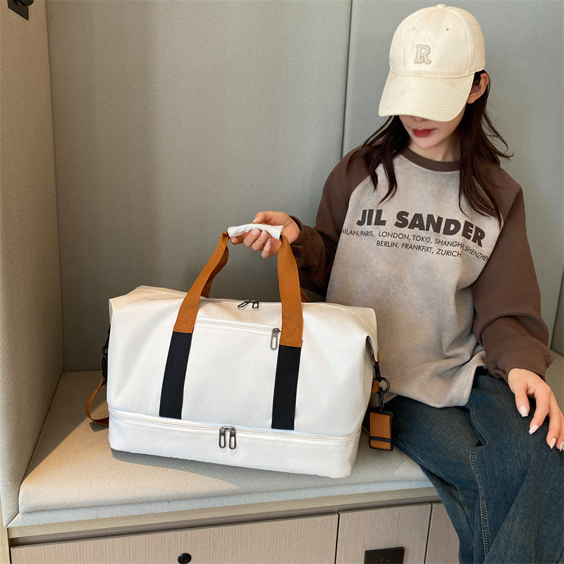 Sporty travel bag with sturdy carrying handles and adjustable shoulder strap Stornfield