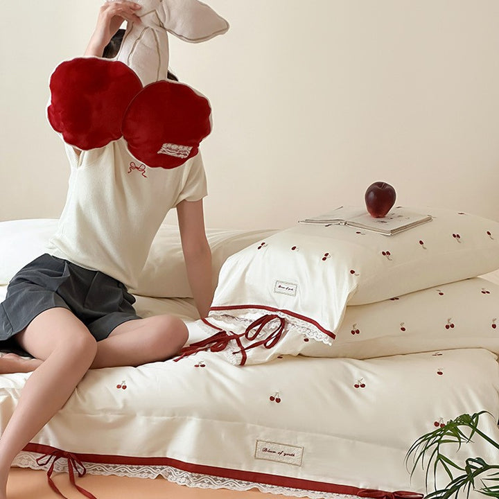 Romantic cotton satin duvet cover set with embroidered cherries, lace trim, and ties