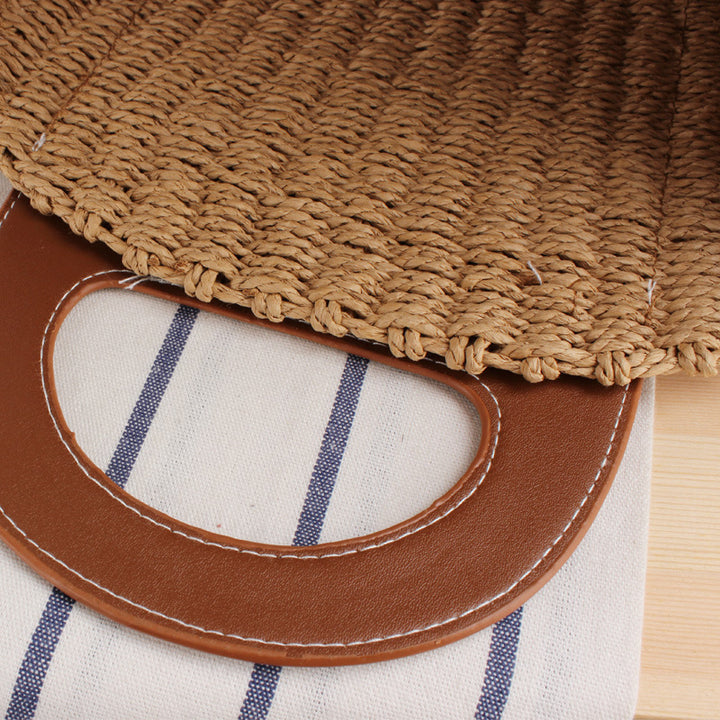 Natural raffia tote bag with elegant leather accents Stornfield