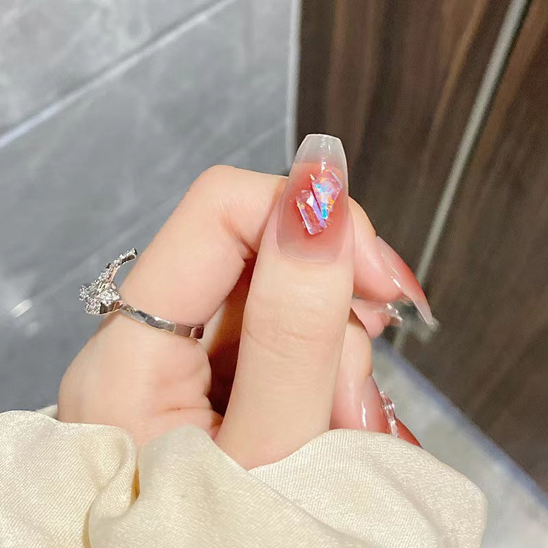 Artistic acrylic nails with glitter elements Stornfield