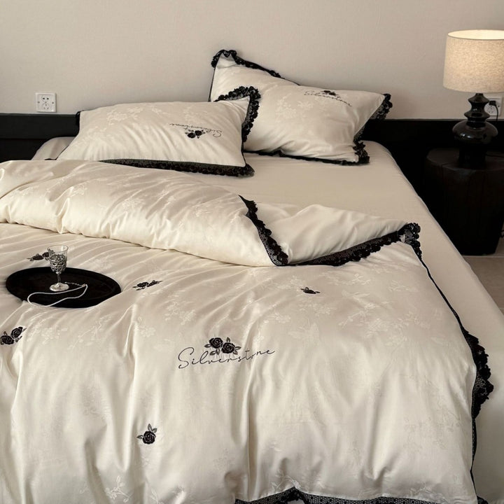Luxurious cotton satin bedding set with lace border and rose embroidery