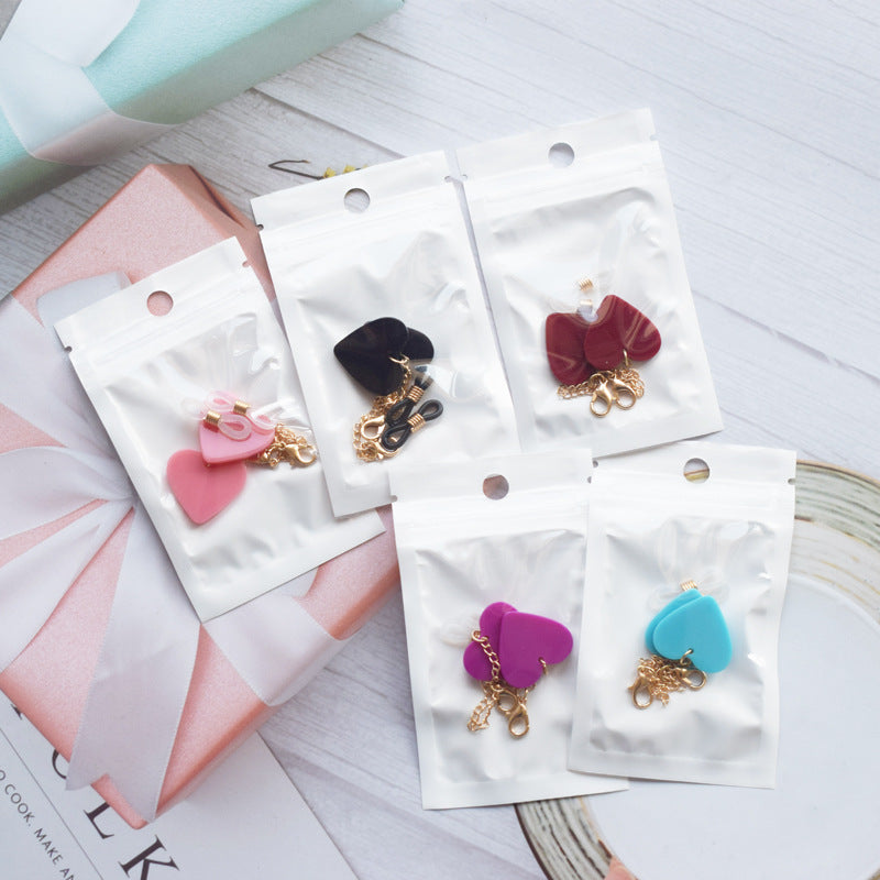 Heart-Shaped Dangle Earrings with Gold Chain Stornfield