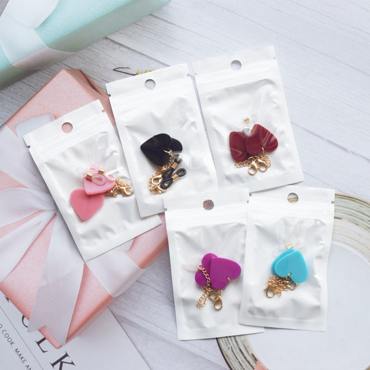 Heart-Shaped Dangle Earrings with Gold Chain Stornfield