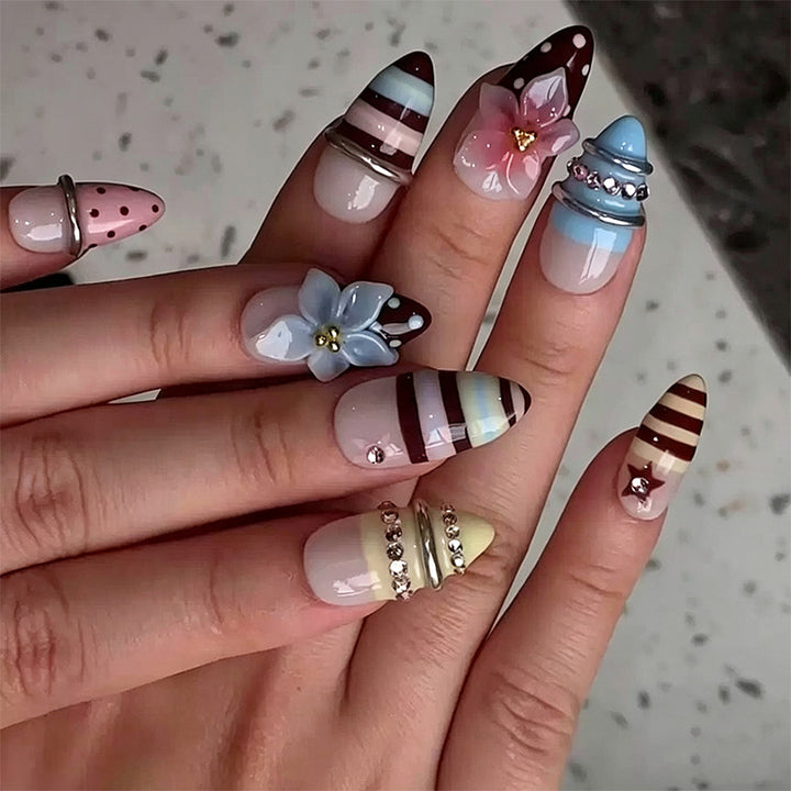 Nail art set with floral and geometric designs Stornfield