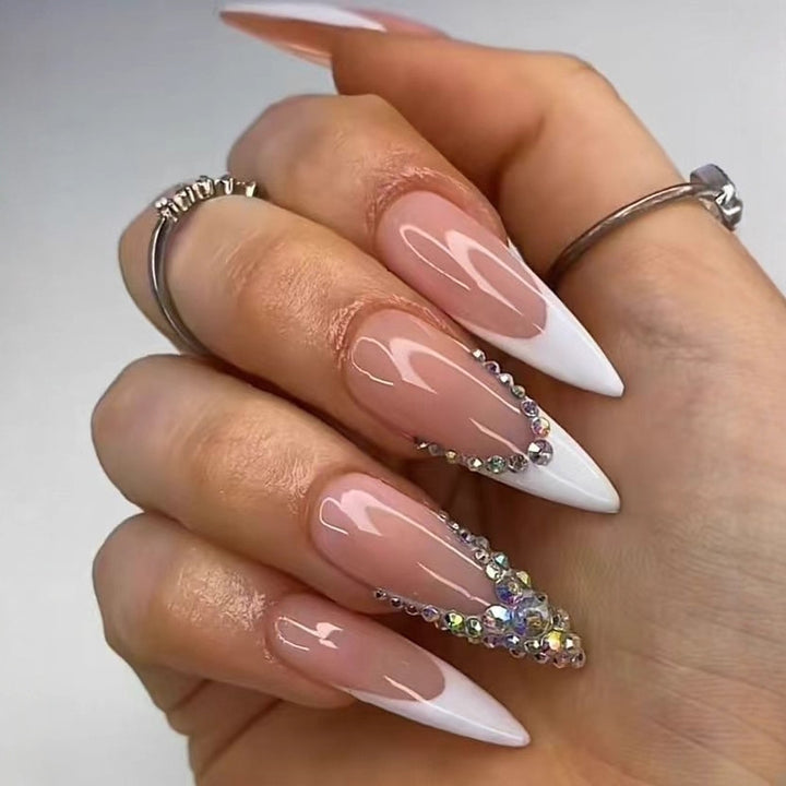 Artificial nail set with glamorous rhinestone decorations and elegant tips Stornfield
