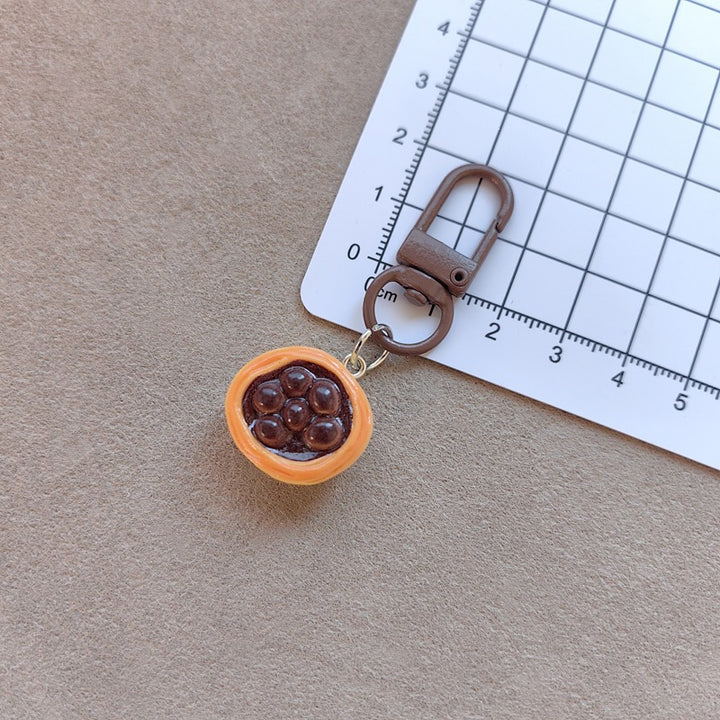 Keychain with cute cake design Stornfield